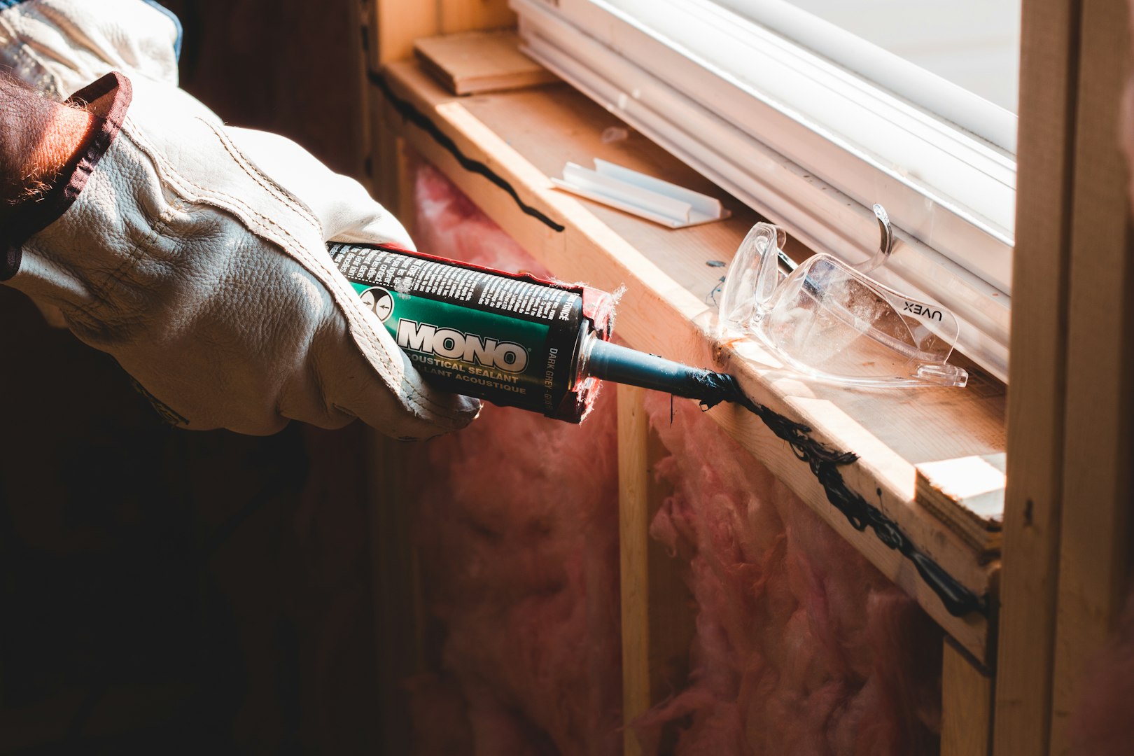 Engineer repairing door handle mechanism in technical area. Concept of HR and recruitment, focusing on skill, craftsmanship, and workplace professionalism.